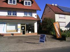 Laden mit Lamellenvorhängen 