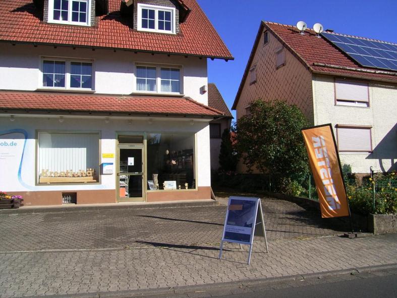 Laden mit Lamellenvorhängen 