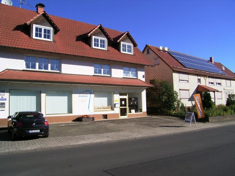 Laden mit Lamellenvorhängen 